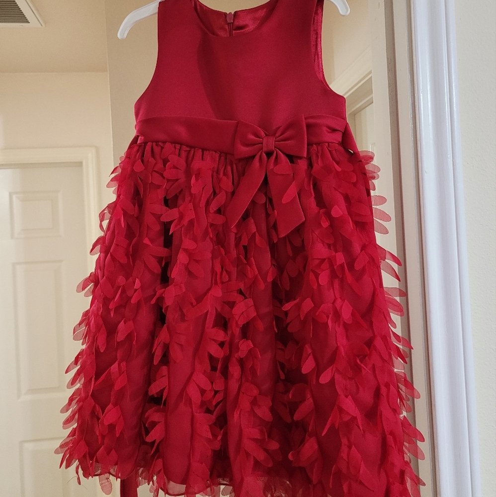 Beautiful, red ruffely, flowerly dress.